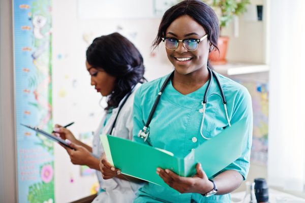 Image of two nurses doing their work